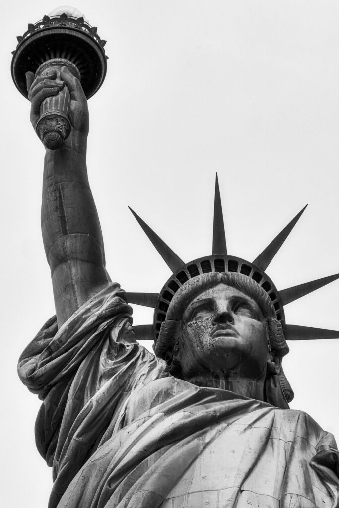 Photo of A dramatic black and white close-up of the iconic Statue of Liberty in New York City by Vinicius Dattwyler | Pexels